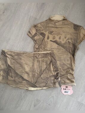 Body by Raven Tracy Tan Camo Short Sleeve Mock Neck Top